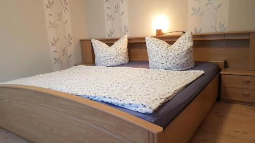 En eller flere senge i et værelse på Ferienwohnung-Nickl