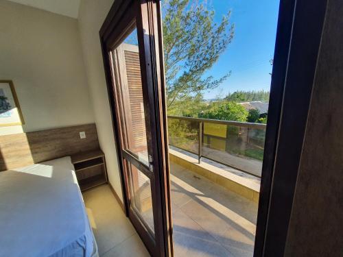 Postel nebo postele na pokoji v ubytování Hotel Pousada Capão