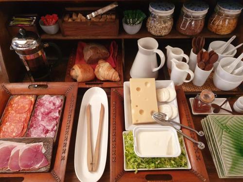 a set of trays with different types of food at La Maison Provençale in La Roquebrussanne