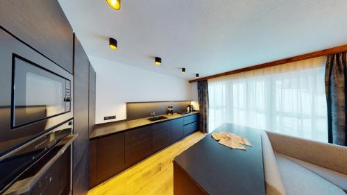 TV a/nebo společenská místnost v ubytování A CASA Brilliant