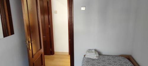 Katil atau katil-katil dalam bilik di Precioso apartamento con patio