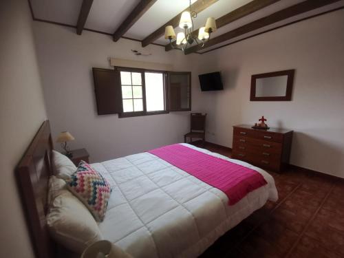 Postel nebo postele na pokoji v ubytování Casa LA JOYA