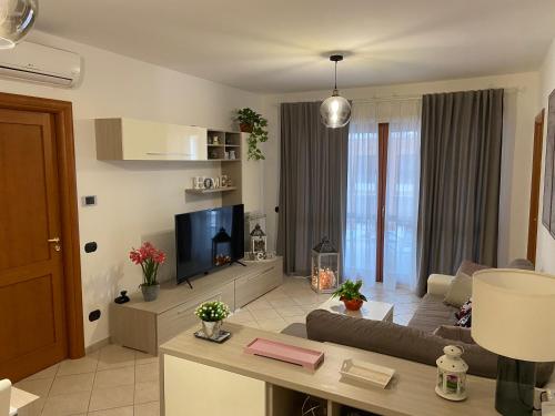 A kitchen or kitchenette at AGM Suite Rome Airport FCO - Attico Parco Leonardo