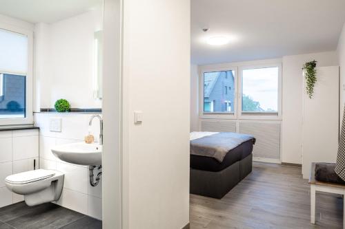 Ένα ή περισσότερα κρεβάτια σε δωμάτιο στο Hotel Sauerlandvilla Winterberg