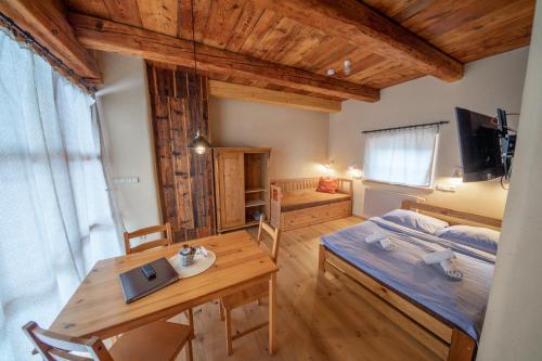 Postel nebo postele na pokoji v ubytování Apartment Ve Mlýně