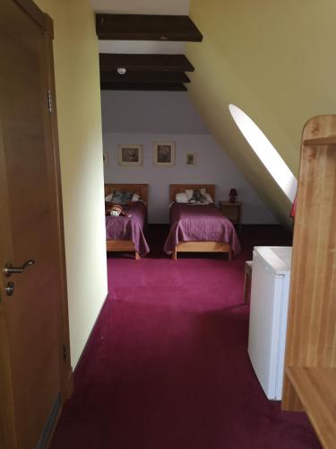 Postel nebo postele na pokoji v ubytování Hotel Senlīči