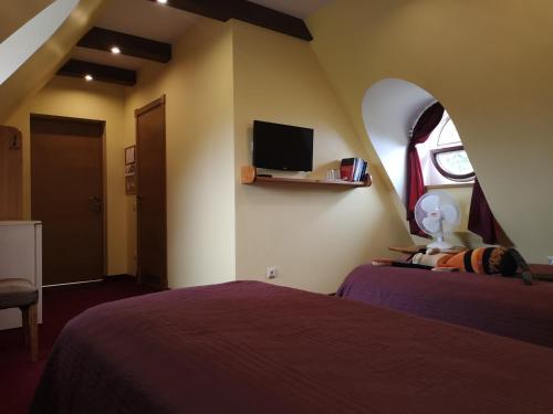 Postel nebo postele na pokoji v ubytování Hotel Senlīči