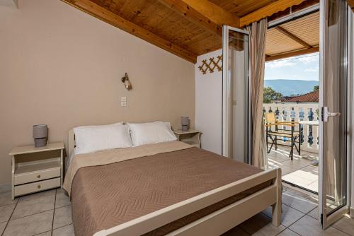 Postel nebo postele na pokoji v ubytování Hotel Tassia for families & couples - Apartments