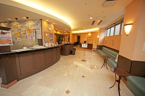 Zona de hol sau recepție la Hotel Prime inn Toyama