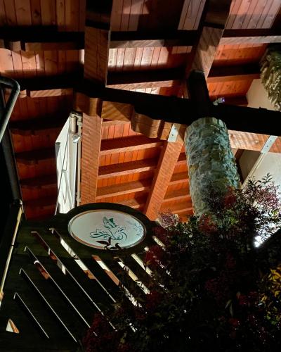 a building with a sign with a lizard on it at BALMA DEI CUP con SPA privata su richiesta in Pont Canavese