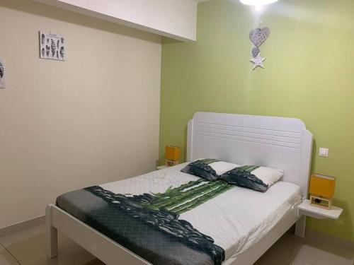 Postel nebo postele na pokoji v ubytování Superbe appartement à Trinité