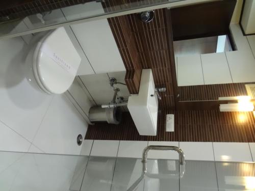 Koupelna v ubytování Shantai Hotel