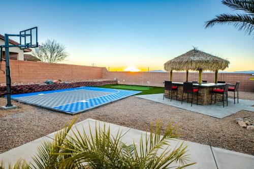 a backyard with a table and a gazebo at 3400 SqFt House W/40Ft Heated Pool/Spa- Strip View in Henderson