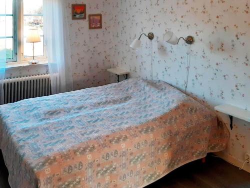 Katil atau katil-katil dalam bilik di 7 person holiday home in ÖXABÄCK-By Traum