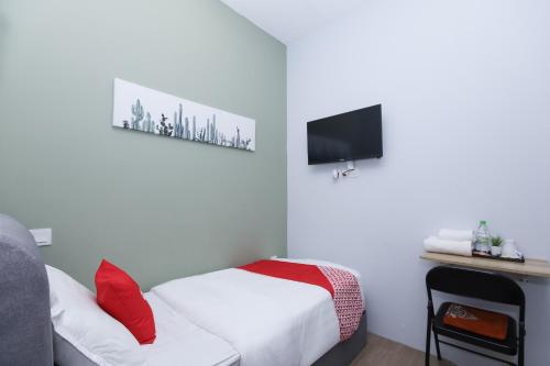 Imagen de la galería de OYO 90399 Green Home Hotel syariah, en Sepang