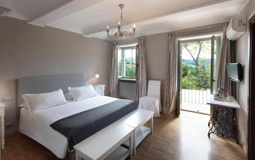 Postel nebo postele na pokoji v ubytování Cascina Meriame