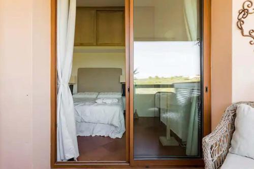 Katil atau katil-katil dalam bilik di Romantico Appartamento Vista Mare