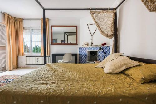 Giường trong phòng chung tại Villa Mimosa