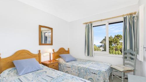 Postel nebo postele na pokoji v ubytování Can 1 - Calella de Palafrugell
