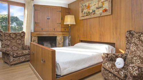 Katil atau katil-katil dalam bilik di Est Benet - Calella de Palafrugell
