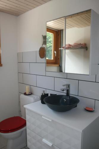 A bathroom at BnB Le Loft Im Fang
