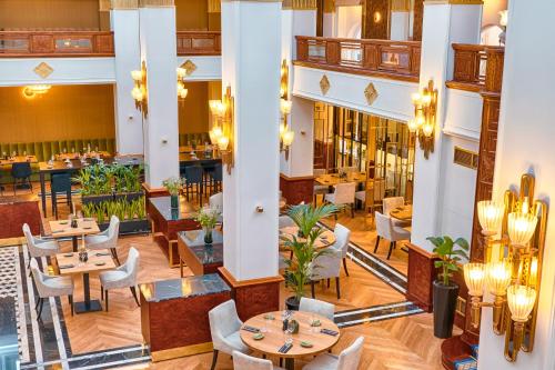 Reštaurácia alebo iné gastronomické zariadenie v ubytovaní Focus Hotel Premium Pod Orłem
