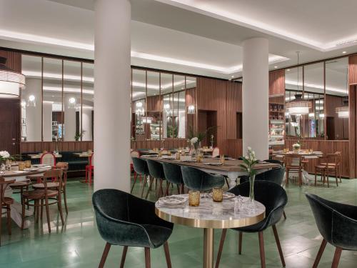 Een restaurant of ander eetgelegenheid bij Hotel Colón Gran Meliá - The Leading Hotels of the World