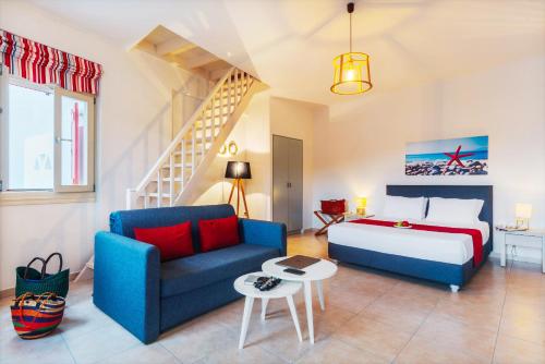 A seating area at Aelia Apartments & Suites