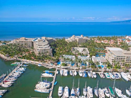 an aerial view of a marina with boats in the water at Paradise Village in Nuevo Vallarta 