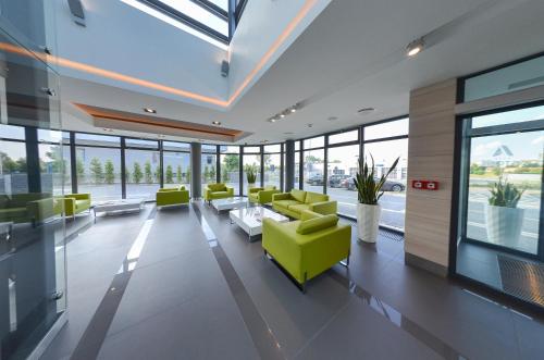 Χώρος καθιστικού στο Hotel Astone Conference & Spa