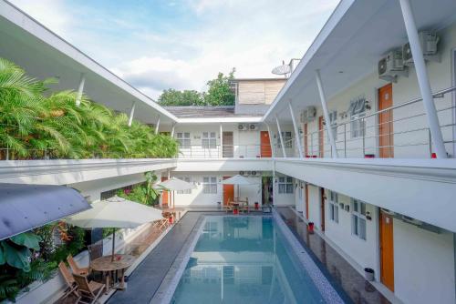 Foto da galeria de Urbanview Hotel Syariah Casa Azmya Yogyakarta em Kejayan