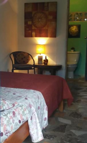 Postel nebo postele na pokoji v ubytování La Casita de Don Daniel