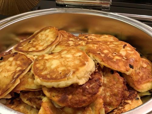 a bowl of pancakes in a pan at Hotel Ambiente Walldorf in Walldorf