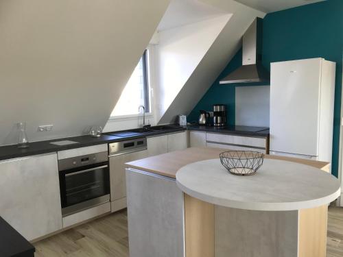 Η κουζίνα ή μικρή κουζίνα στο appartement calme en campagne