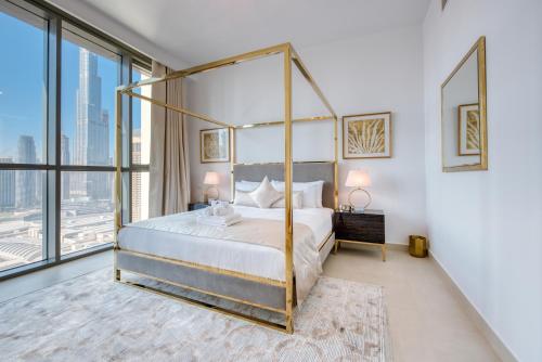 Postel nebo postele na pokoji v ubytování Spectacular Burj Khalifa and Fountain Views on 32nd floor