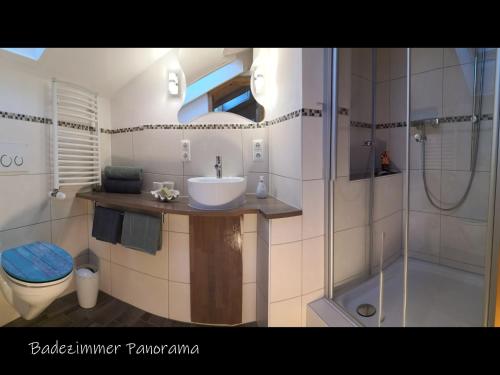 Ένα μπάνιο στο Beste Zeit Ferienwohnung