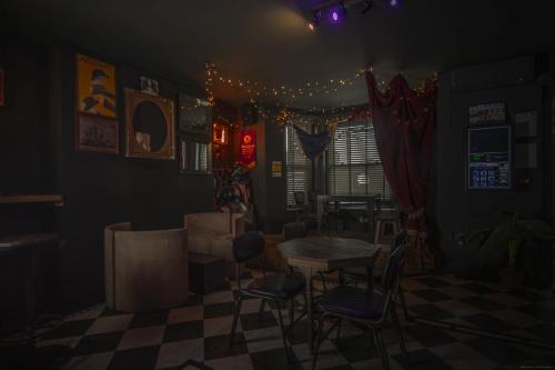 a living room filled with furniture and lights at The Albion Rooms in Margate