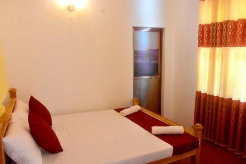 Postel nebo postele na pokoji v ubytování Chipmunk Home Stay