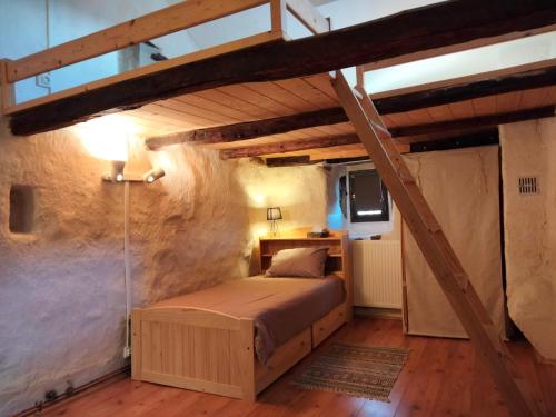Postel nebo postele na pokoji v ubytování Le Relais des Bouziges