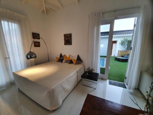 Voodi või voodid majutusasutuse PENTHOUSE Jan Thiel Curacao toas