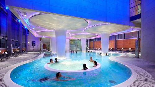 a group of people in a pool in a building at Studio in Lansdown, Bath BA1 in Bath