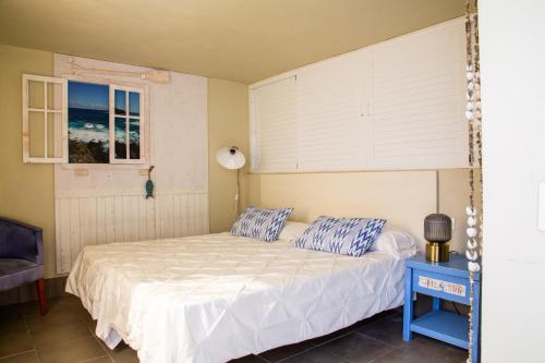 A bed or beds in a room at Vistas al Mar junto a la Playa 3D