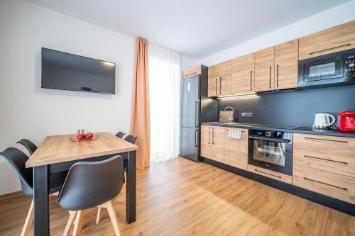 Kuchyňa alebo kuchynka v ubytovaní Apartmán na Bukovce MALMA
