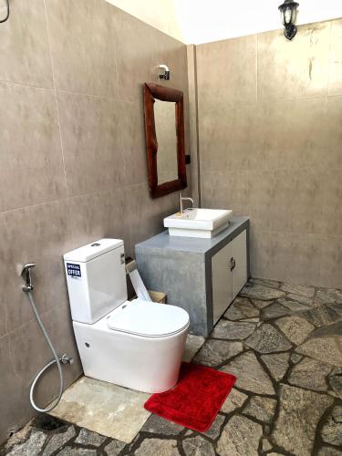 Un baño de Mango Tree House