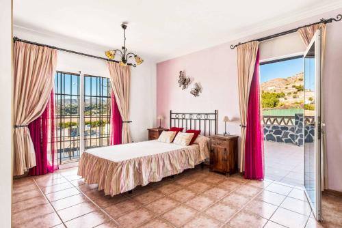 Posteľ alebo postele v izbe v ubytovaní Villa Sol Nerja