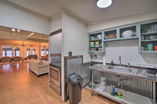 a kitchen with a sink and a counter top at Private Beach Waterfront Disney Getaway! in Disney