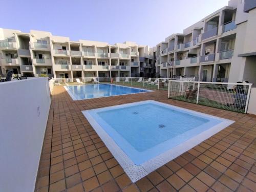 Bazén v ubytování Rizi Corralejo Sun nebo v jeho okolí