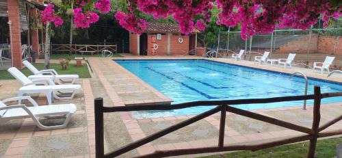 Πισίνα στο ή κοντά στο Hotel Campestre UMPALÁ