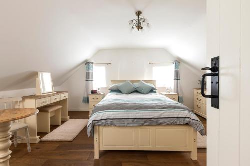 Ένα ή περισσότερα κρεβάτια σε δωμάτιο στο Katie's Cottage Bellaghy