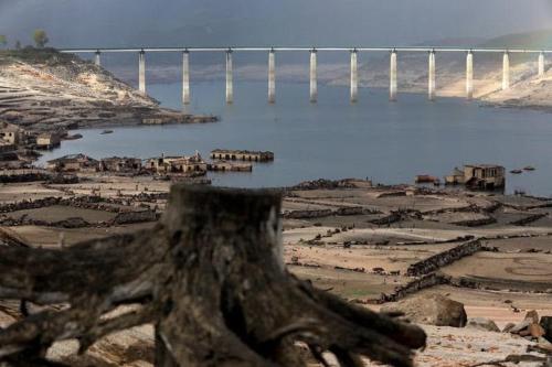 a view of a bridge over a body of water at Secondary home in Lobios